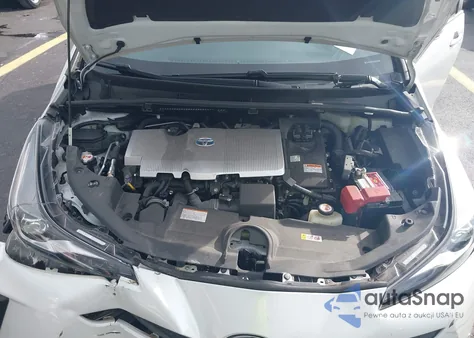 2021 Toyota Prius Xle z USA, uszkodzony, nr VIN JTDKAMFU7M3138534